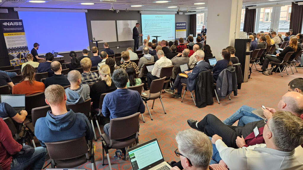 People at conference listening to speaker with projector presentation